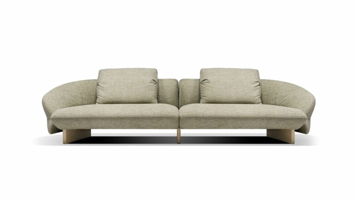 Side view of Fleur by Nicoline showcasing its sculpted armrest and elegant stitching.