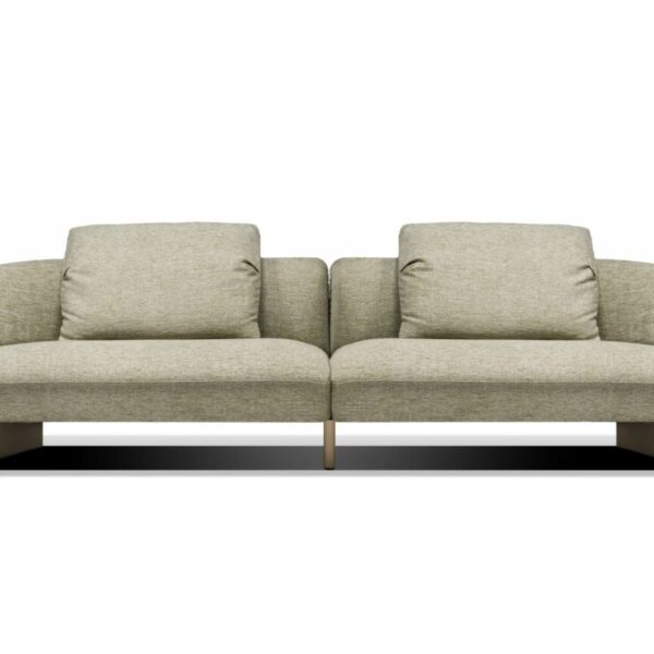 Side view of Fleur by Nicoline showcasing its sculpted armrest and elegant stitching.