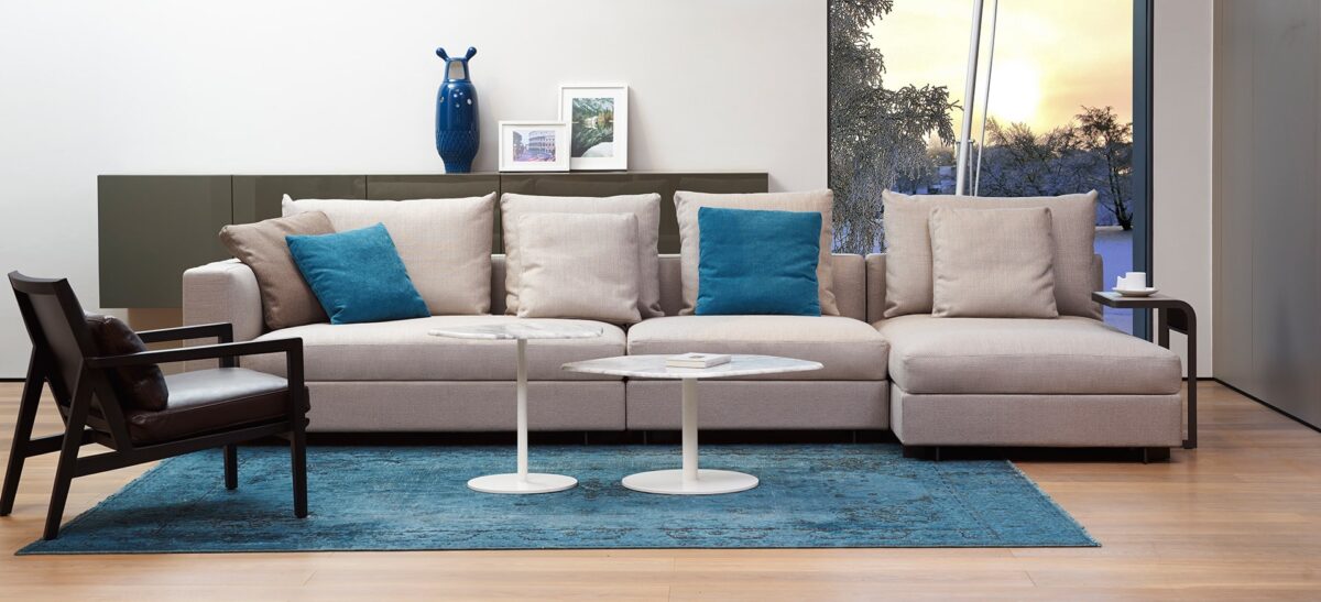Padded lounge chair with sleek legs