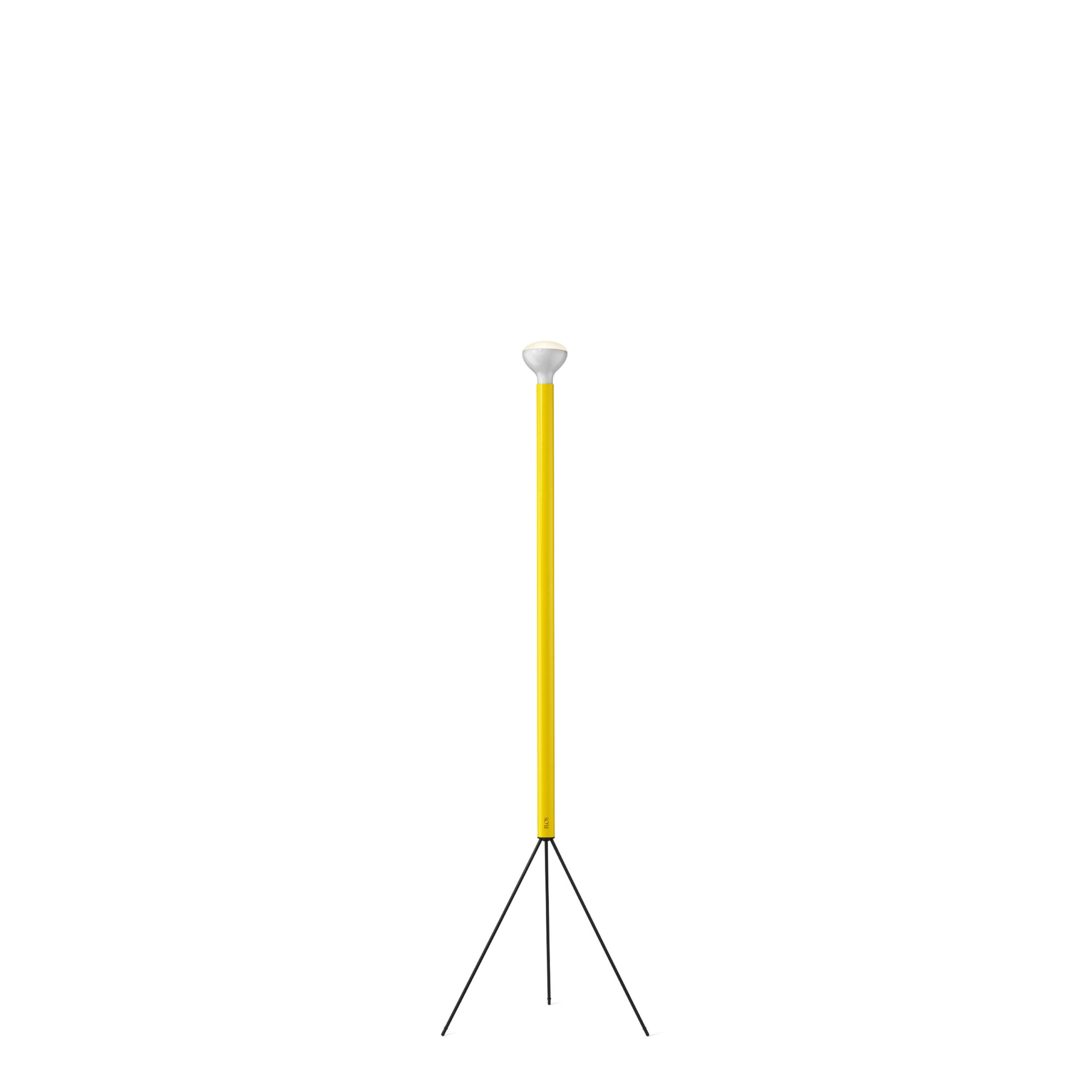Luminator by Flos, Tall upright floor lamp with slender colored tube and indirect uplight dome, standing on three thin metal tripod legs.