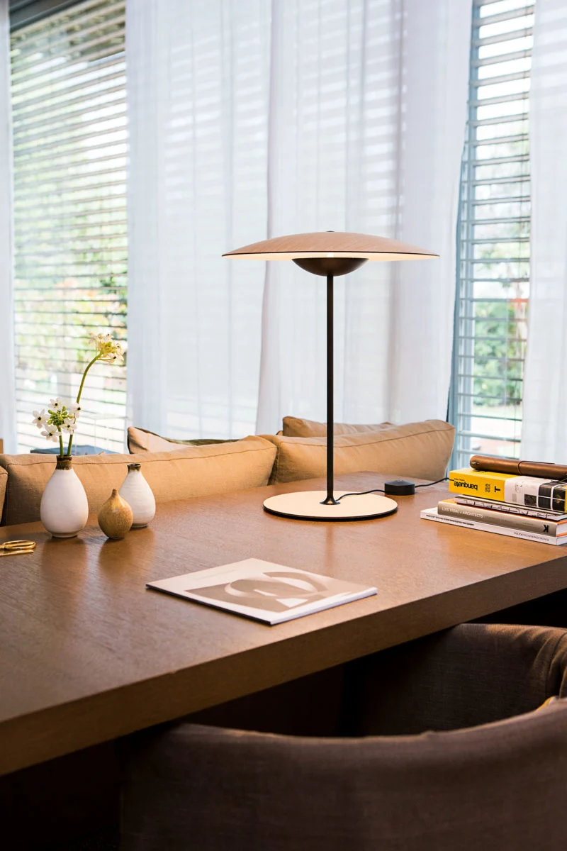 “Contemporary table lamp Ginger by Marset – sculptural wood shade offering cozy warm lighting”