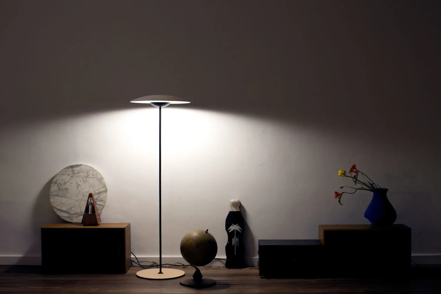 “Contemporary table lamp Ginger by Marset – sculptural wooden shade providing cozy illumination”