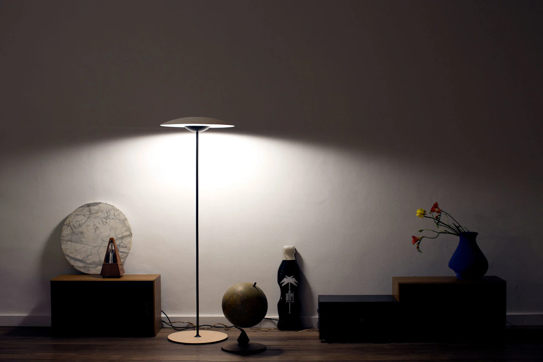 “Contemporary table lamp Ginger by Marset – sculptural wooden shade providing cozy illumination”