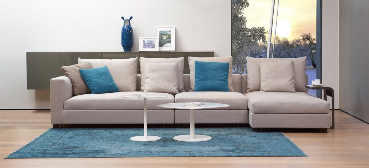 "Hanna Shape Table by Camerich, a unique and modern design with elegant curves, perfect for adding a stylish and functional centerpiece to contemporary dining spaces."