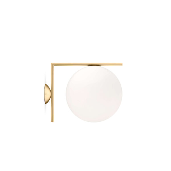 A contemporary Flos IC Lights C/W2 wall or ceiling lamp with a large, spherical white opaline glass diffuser poised on a slender, L-shaped metal arm, providing diffused light.