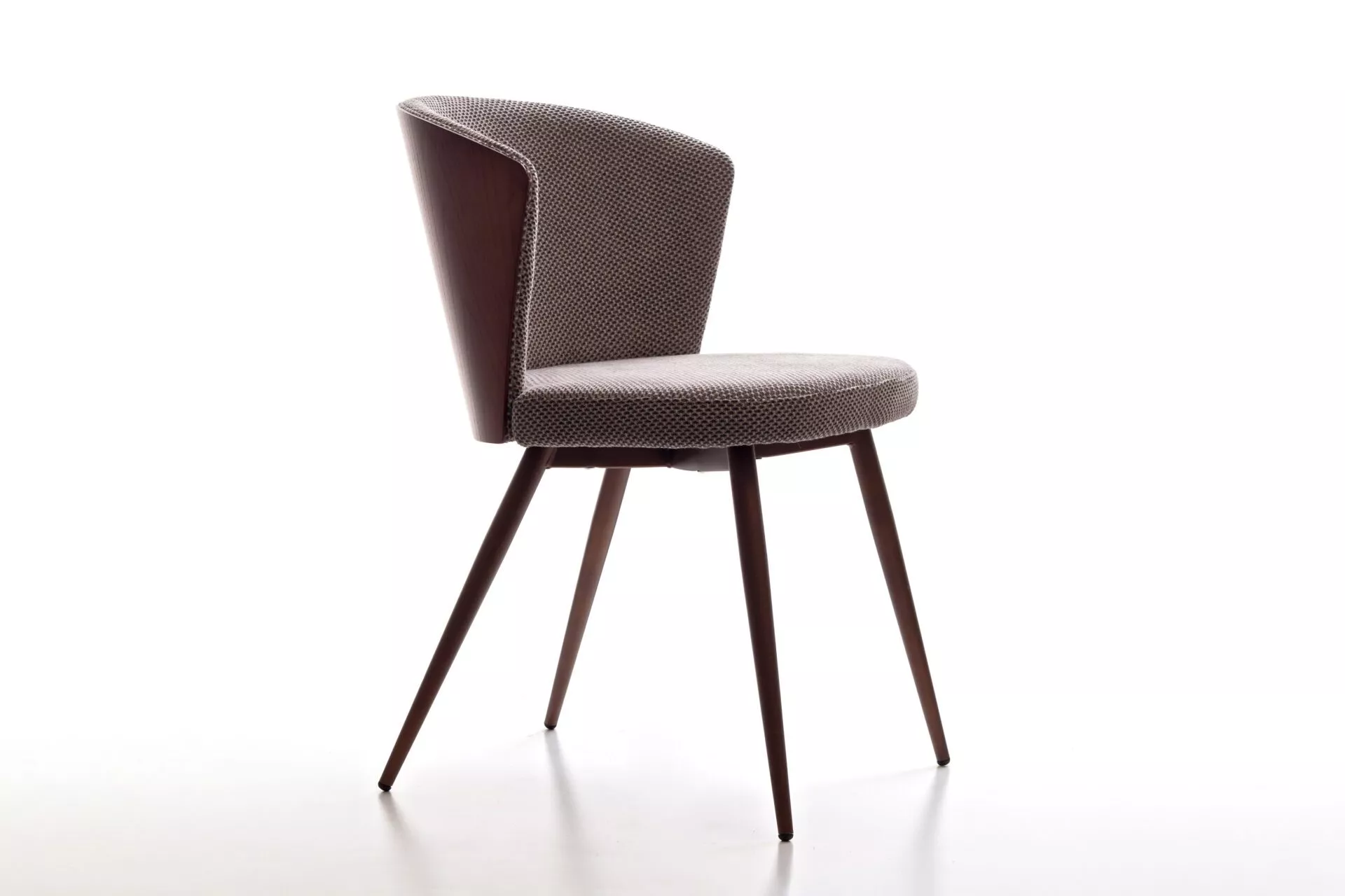 Ines W bar stool upholstered in medium‑grey fabric with curved wrap‑around backrest, mounted on chrome gas‑lift column and square base.