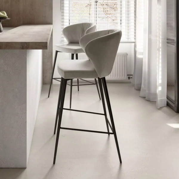 Peressini Ingrid Chair featuring a sleek, ergonomic design with high-density foam padding and a quilted outer backrest, upholstered in luxurious faux leather or real leather.