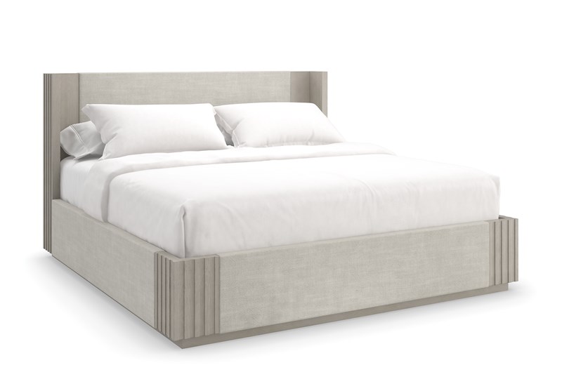 Caracole Azure King Bed featuring a crisp linen upholstered headboard, footboard, and side rails, with slatted corner details in a neutral taupe 'Fossil' finish.