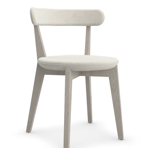 Be My Guest by Caracole — an inviting upholstered chair with curved back and plush seat.