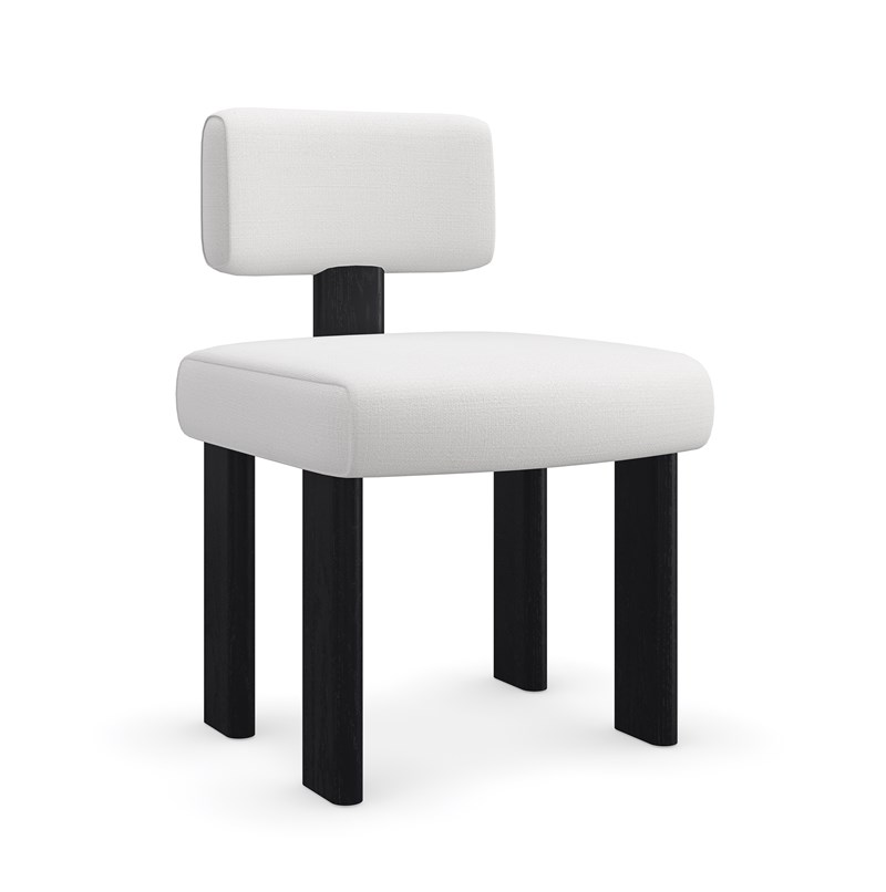 Perry by Caracole — a sleek lounge chair with a low-profile design and plush upholstered cushions.