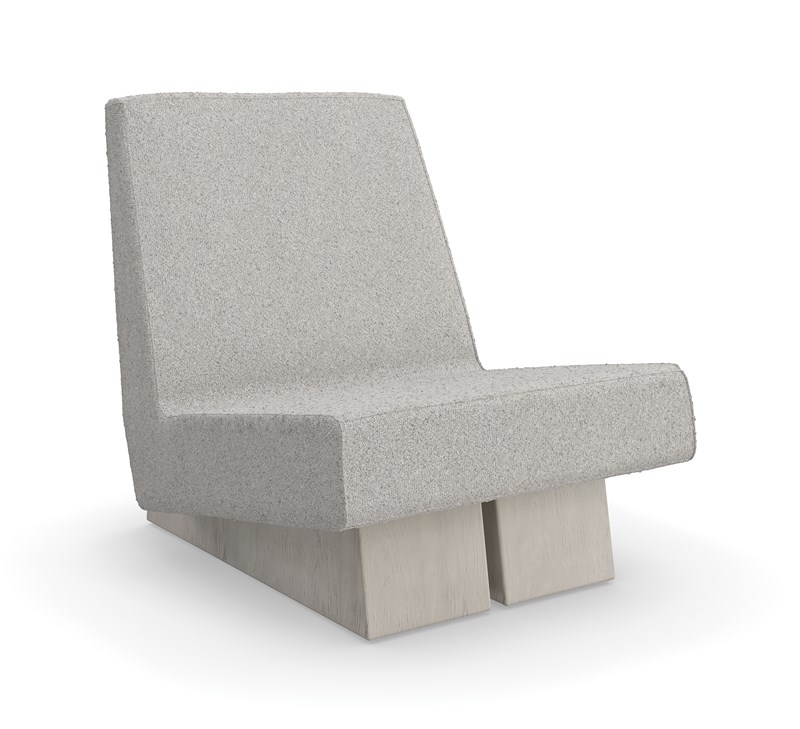 Modern accent chair with clean lines and luxurious boucle fabric, perfect for adding a sophisticated touch to contemporary living spaces in Royal Oak, Michigan.
