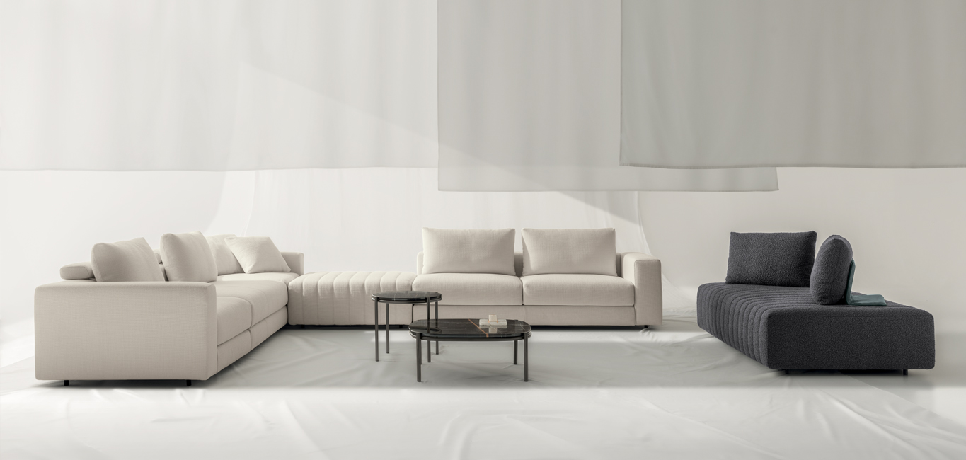 Contemporary Cuba Split sofa by Nicoline featuring deep cushions and clean lines.