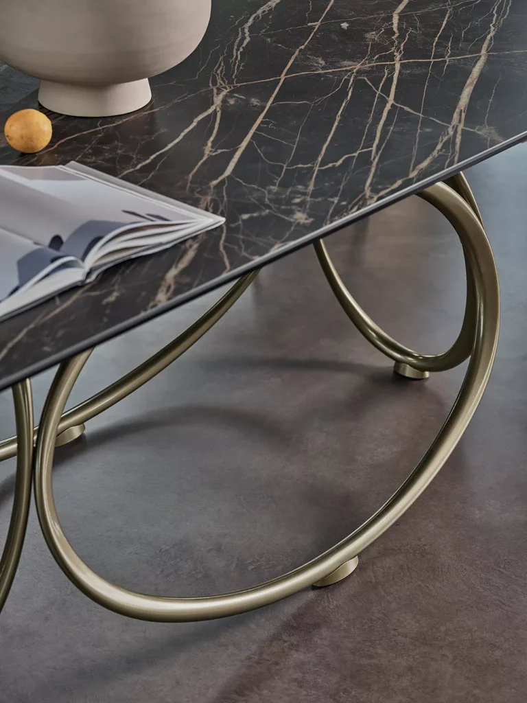 Louis dining chair by Bontempi in a bright interior setting with natural wood table.