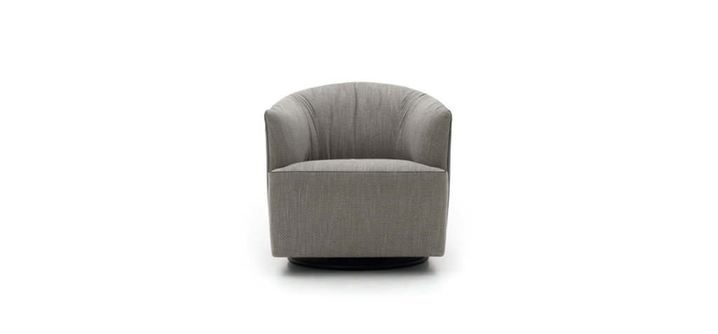 Lady Swivel armchair by Nicoline Italia with enveloping backrest and wooden swivel base, perfect for modern interiors in Royal Oak, Michigan.