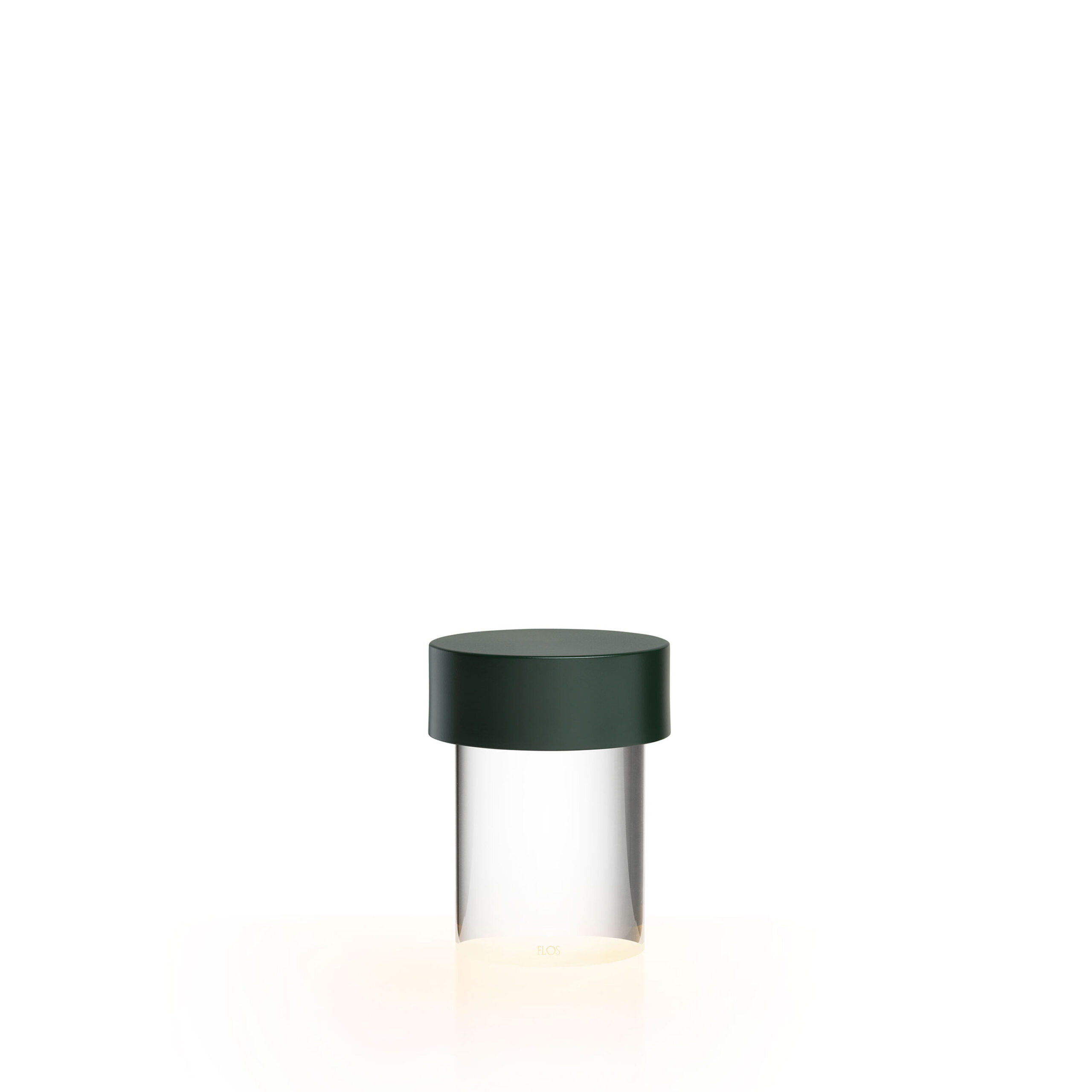 Last Order Clear by Flos featuring a smooth transparent base and polished brass top for refined table lighting.