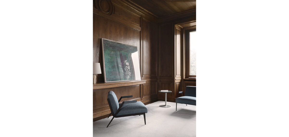 Lima armchair by Nicoline Italia with a sleek metal frame and plush seat, perfect for modern interiors in Royal Oak, Michigan.