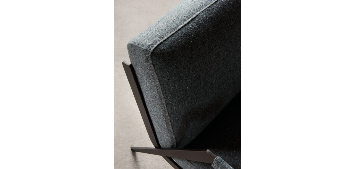 Lima armchair by Nicoline Italia with a sleek metal frame and plush seat, perfect for modern interiors in Royal Oak, Michigan.