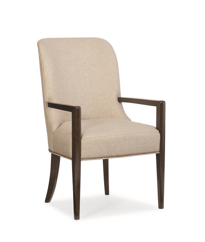 Streamline Arm Chair by Caracole — modern armchair with clean lines, upholstered seat, and wooden frame.