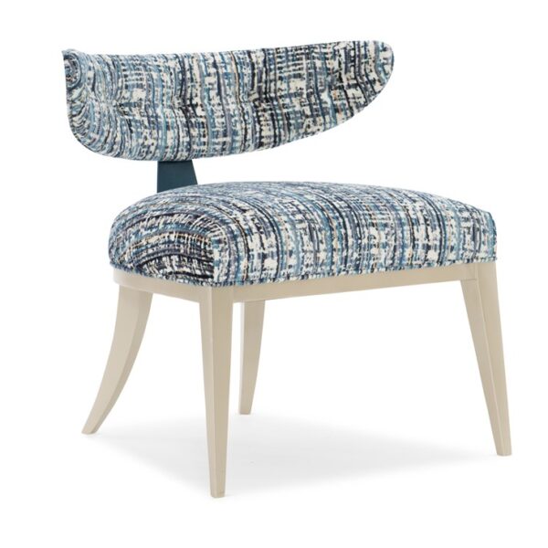 Modern accent chair featuring a cerulean blue metal crescent back and plush poly foam seat cushion, blending retro-inspired design with contemporary elegance.
