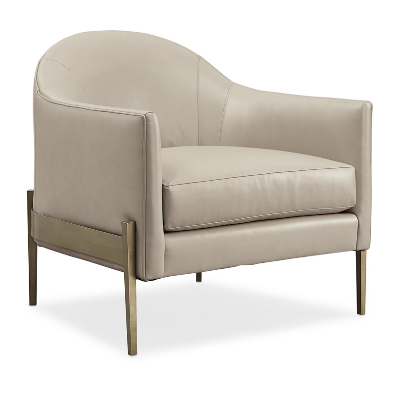 Modern accent chair with a bold silhouette and luxurious upholstery, perfect for contemporary living rooms in Royal Oak, Michigan.
