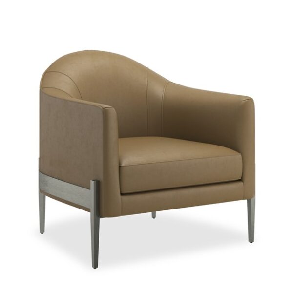 Modern accent chair with a bold silhouette and luxurious upholstery, perfect for contemporary living rooms in Royal Oak, Michigan.