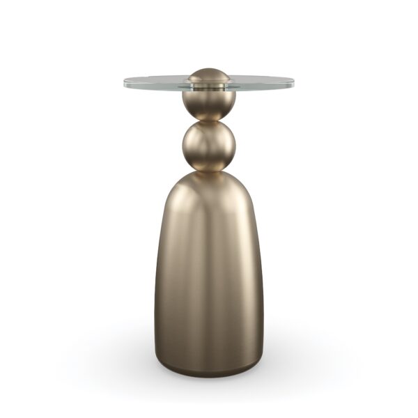 Dissonance Side Table by Caracole – Sculptural resin base in Lucent Bronze Metallic finish with a clear 12mm glass top.