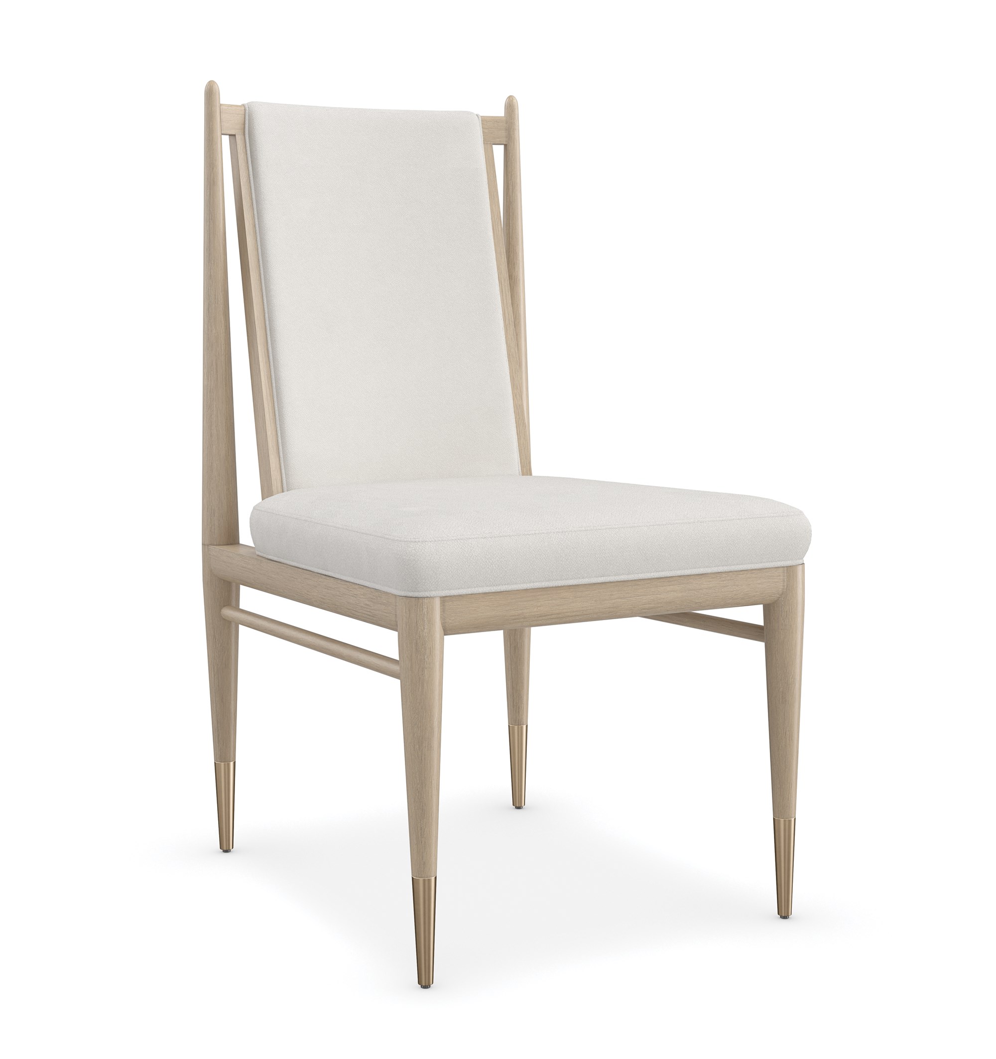 Stylish and sophisticated Unity Light Dining Chair by Caracole, featuring a sleek design with luxurious upholstery and elegant detailing for a modern dining space.
