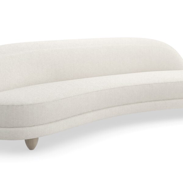 Caracole 110 Tulum Sofa, modern curved sofa, serpentine sofa, biomorphic design sofa, luxury resort furniture, two-tone boucle sofa, cream contemporary sofa, Sabbia feet sofa.