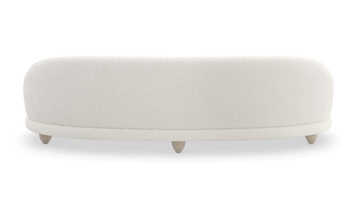 Caracole 110 Tulum Sofa, modern curved sofa, serpentine sofa, biomorphic design sofa, luxury resort furniture, two-tone boucle sofa, cream contemporary sofa, Sabbia feet sofa.