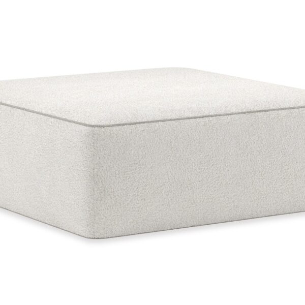 Elegant Marbella Ottoman by Caracole, offering plush seating and a refined design with luxurious upholstery, perfect for adding comfort and style to any living room.