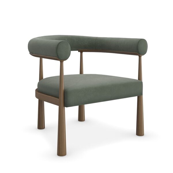 Bali chair by Caracole with elegant curved back and plush upholstery.