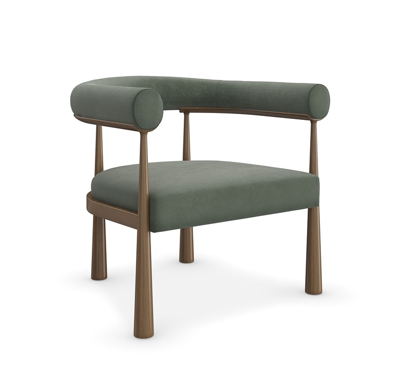 Bali chair by Caracole with elegant curved back and plush upholstery.