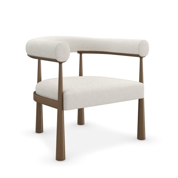 Bali by Caracole accent chair with soft curves and upholstered in neutral fabric.