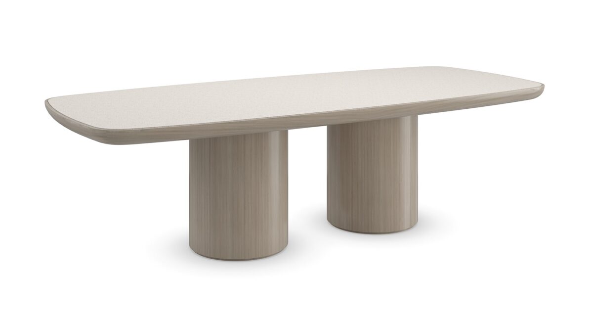 Santorini Dining Table by Caracole – Modern Italian design with silica terrazzo top and rounded pedestals in Sabbia finish. Available in Royal Oak, Michigan.
