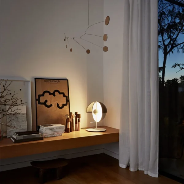 “Theia by Marset minimalist table lamp – innovative lighting design with focused and diffused options”
