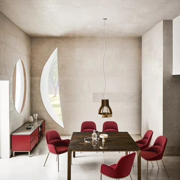 Side angle of Mirage by Bontempi emphasizing its sculptural aluminium base and round-edged barrel shape top in anthracite ceramic.