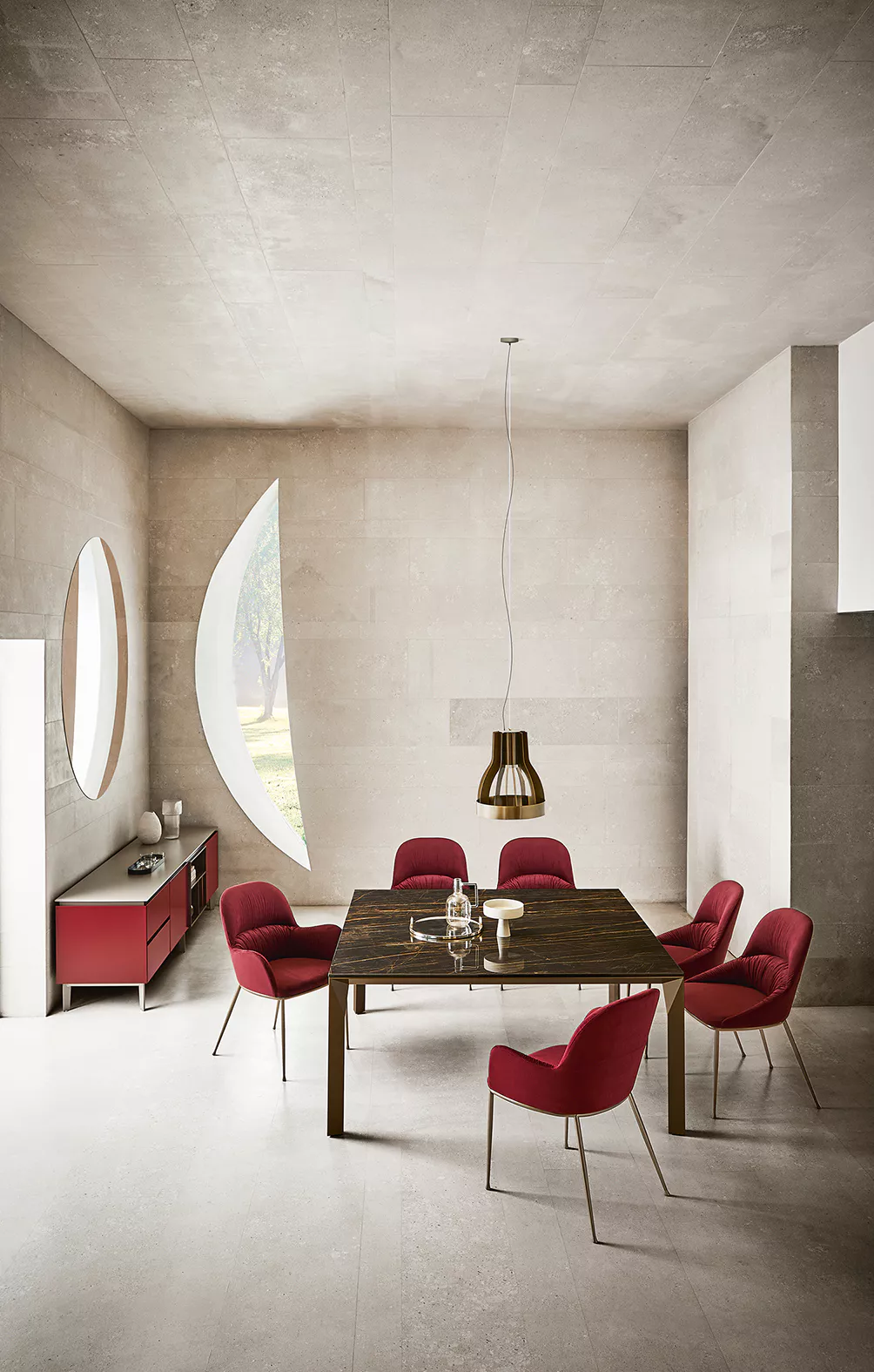 Side angle of Mirage by Bontempi emphasizing its sculptural aluminium base and round-edged barrel shape top in anthracite ceramic.