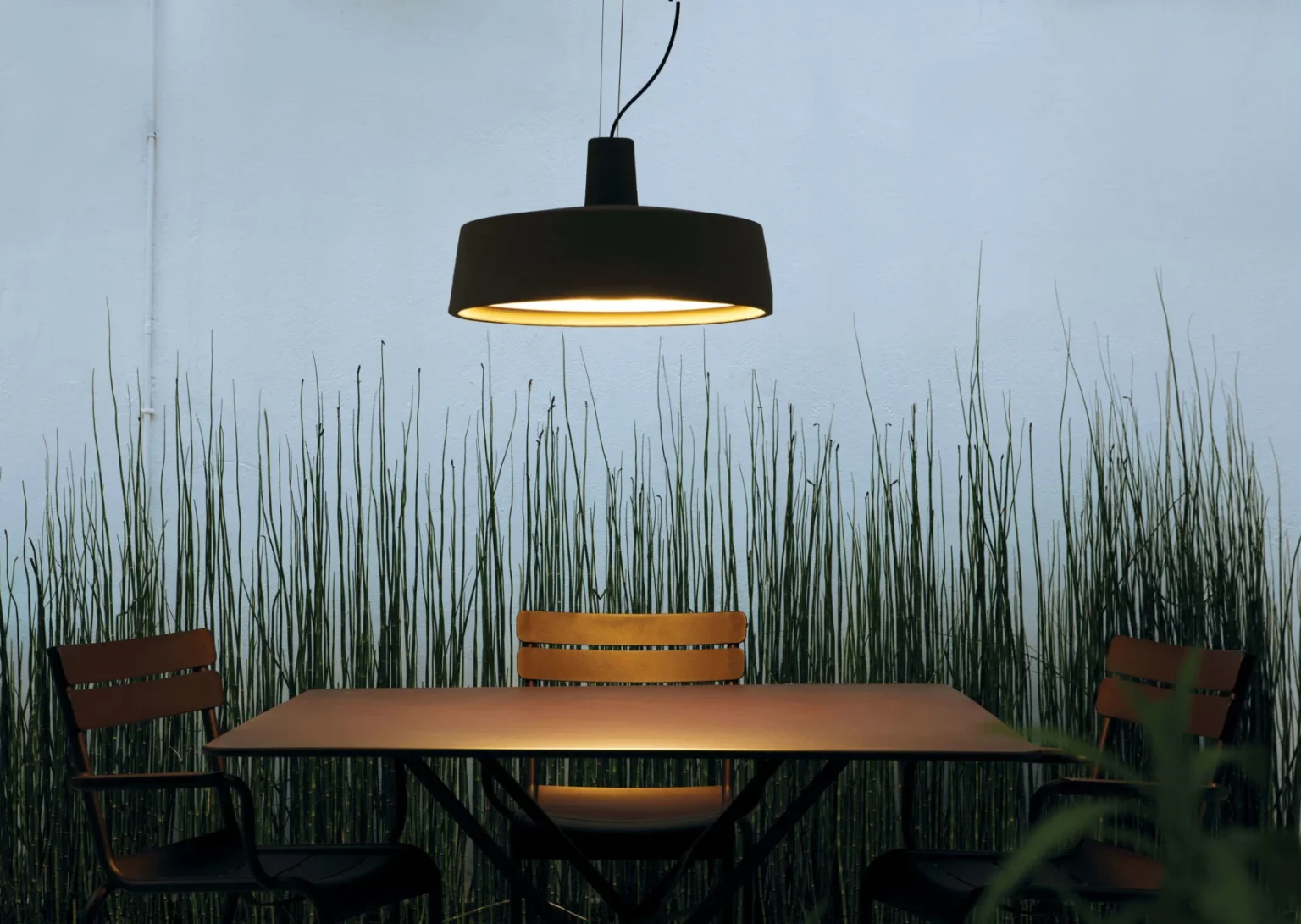 “Soho by Marset ceiling light – contemporary industrial design ideal for urban terraces and porches”