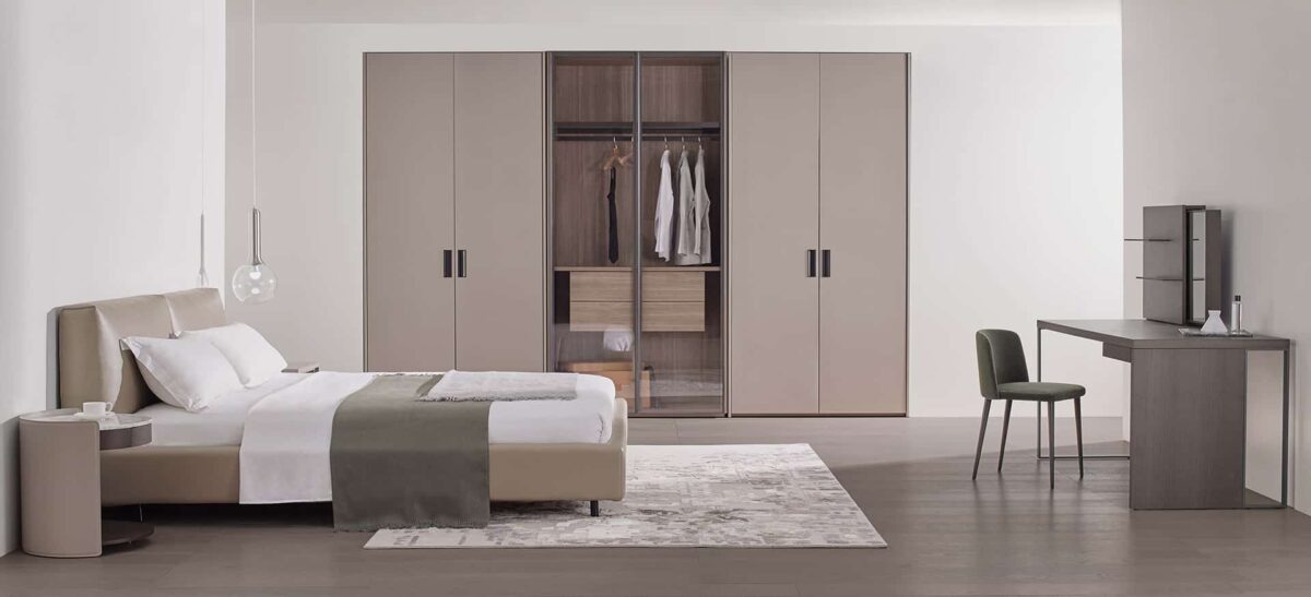 Organic-style bed with natural wood frame and soft upholstered headboard by Camerich.