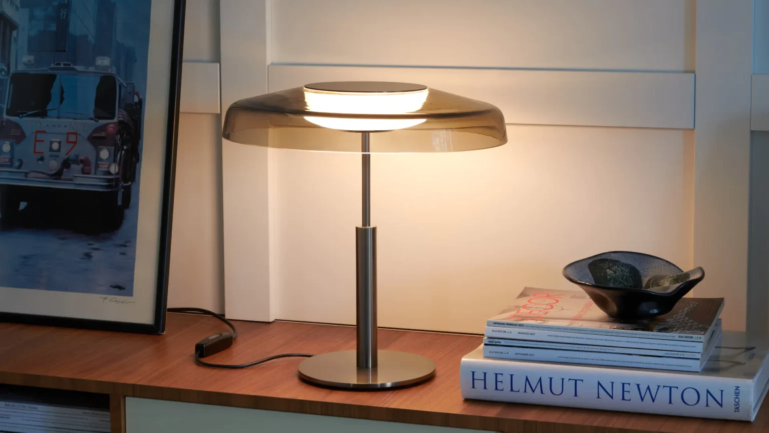 “Dora by Oluce contemporary designer lighting – minimalist lamp with smooth curves and refined craftsmanship”