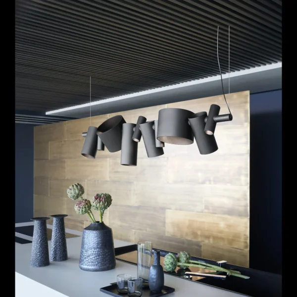 “Dancing Queen by Oluce modern Italian pendant light – sculptural suspended design with fluid metallic frame and soft ambient glow”