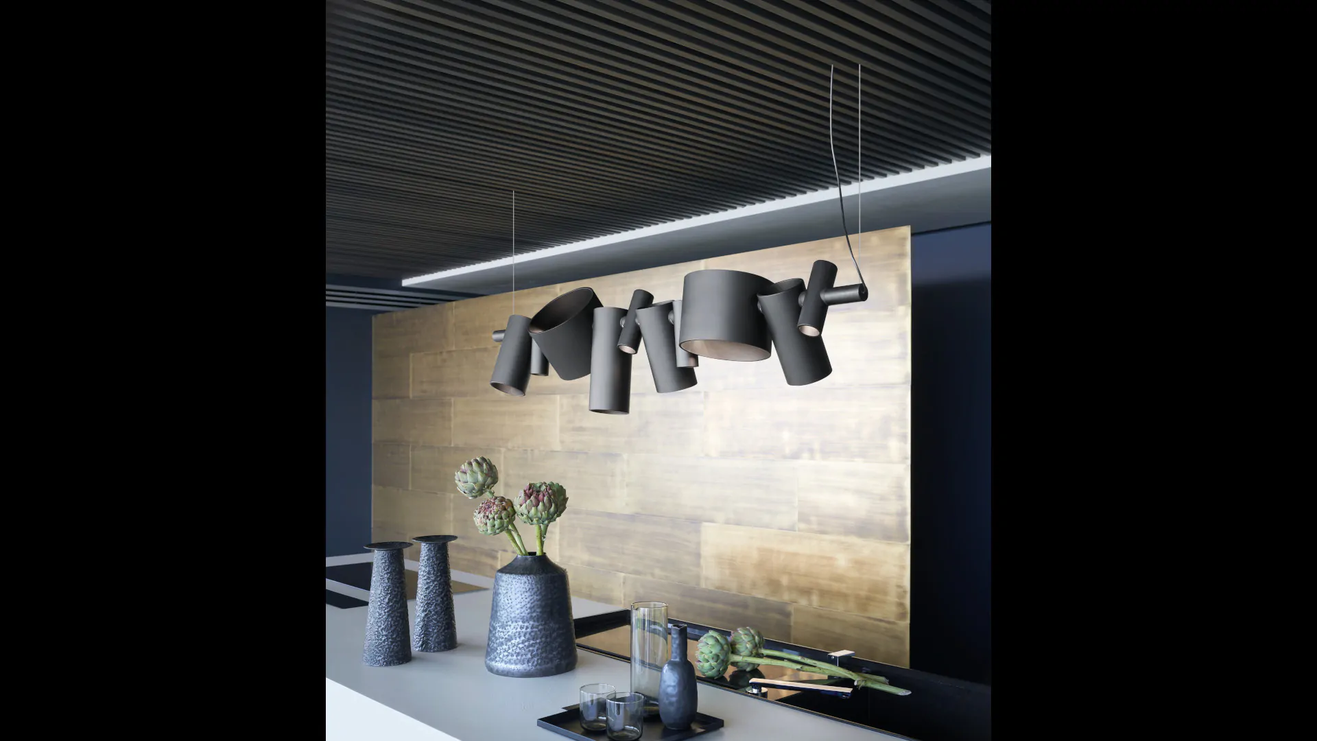 “Dancing Queen by Oluce modern Italian pendant light – sculptural suspended design with fluid metallic frame and soft ambient glow”