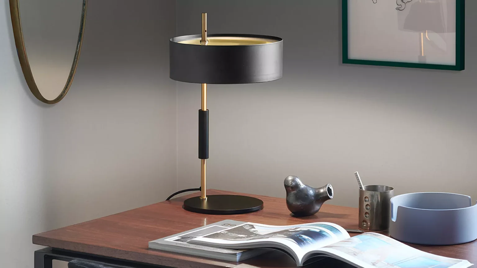  “1953 by Oluce modern Italian designer floor lamp – vintage-inspired lighting with sleek brass and black finish”