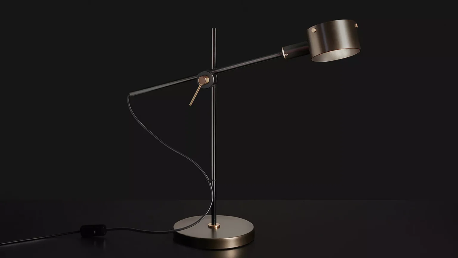 “G.O. by Oluce contemporary designer lighting – elegant metal table lamp with smooth finish and refined details”