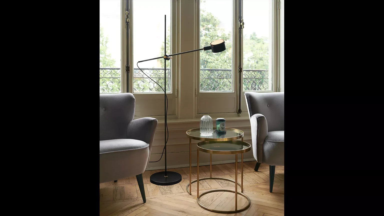 “G.O. by Oluce stylish Italian lamp – elegant mid-century inspired design with warm ambient light”