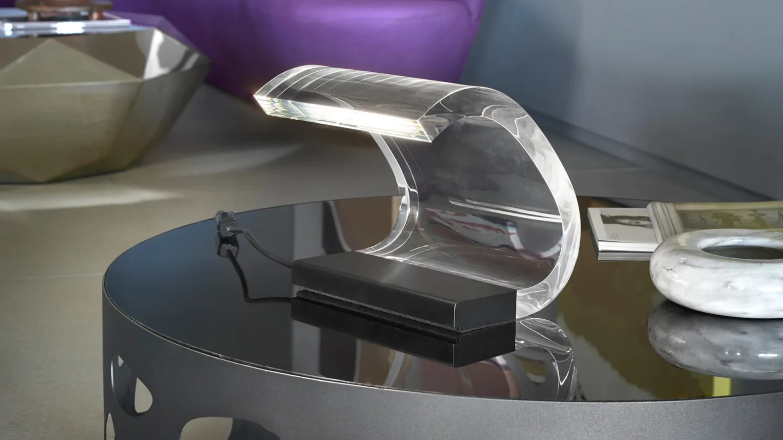 “Acrilica by Oluce designer lighting – contemporary sculptural lamp with glowing acrylic arm and metal base”