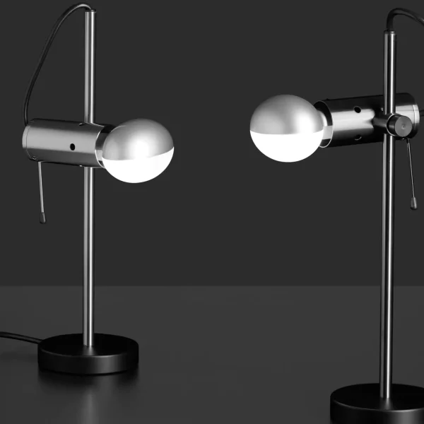 “Agnoli by Oluce modern Italian floor lamp – minimalist spotlight on vertical rod with cylindrical counterweight and industrial elegance”