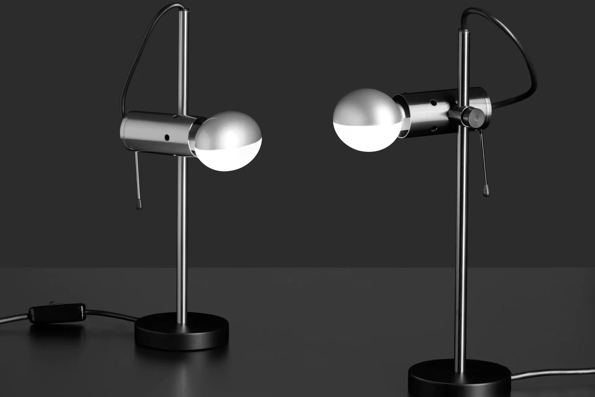 “Agnoli by Oluce modern Italian floor lamp – minimalist spotlight on vertical rod with cylindrical counterweight and industrial elegance”