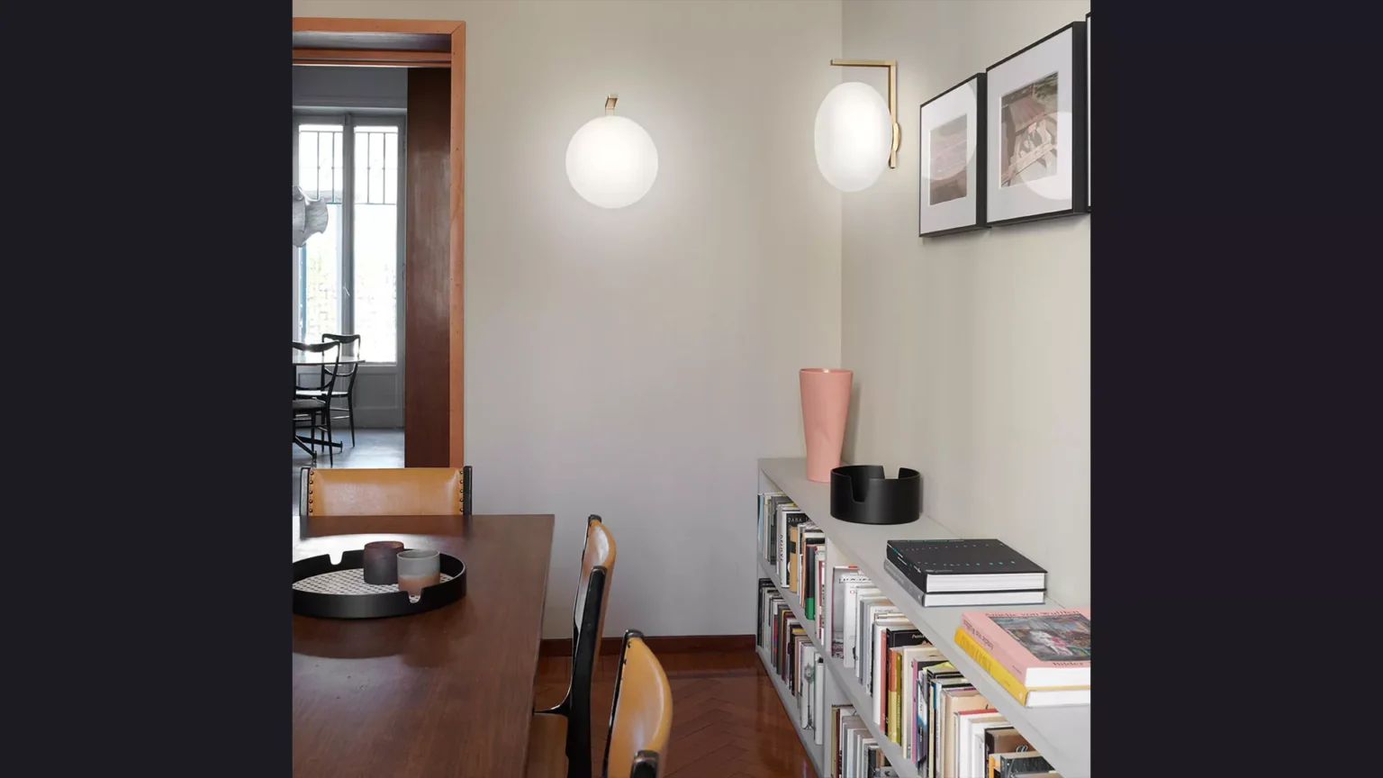 “Alba by Oluce contemporary Italian lighting – sleek curved metal arm with smooth white glass diffuser”