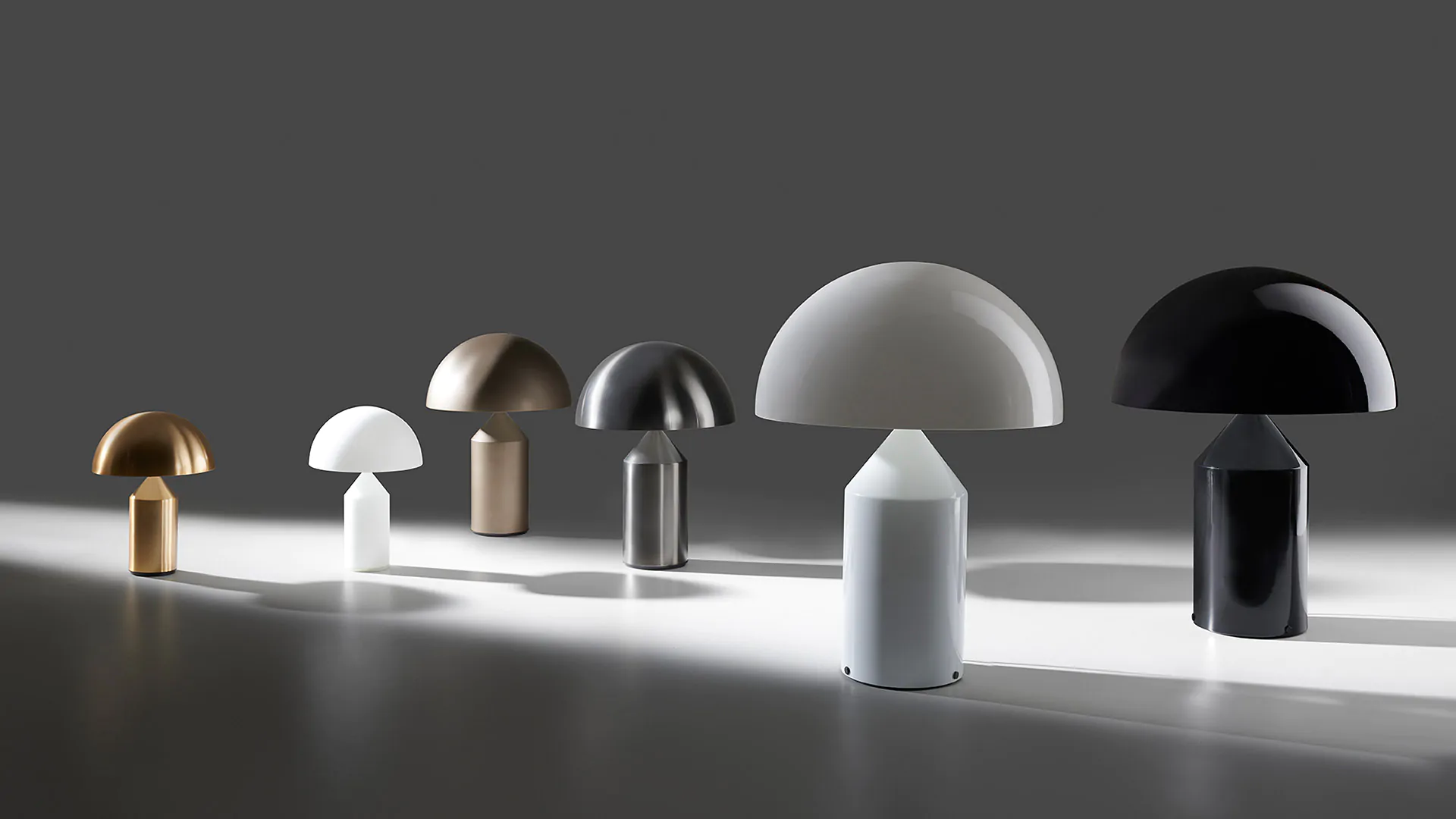 “Atollo Metal by Oluce modern Italian table lamp – iconic metal dome with geometric base in elegant finish”